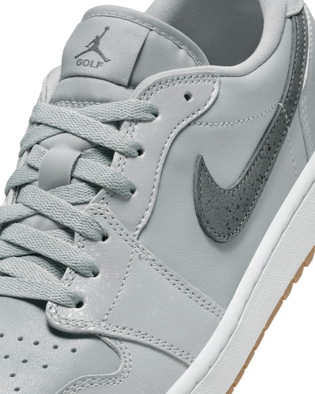 Wolf grey leather air jordan 1 golf sneaker with white laces and gum sole.