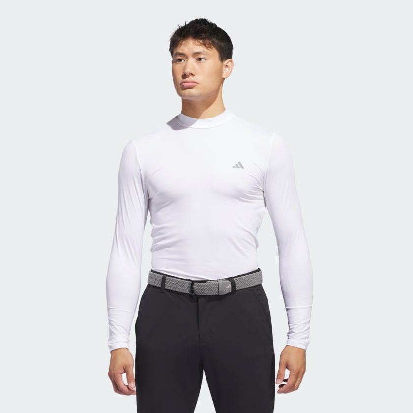 White adidas long-sleeve athletic shirt with a high collar and small logo on the chest.