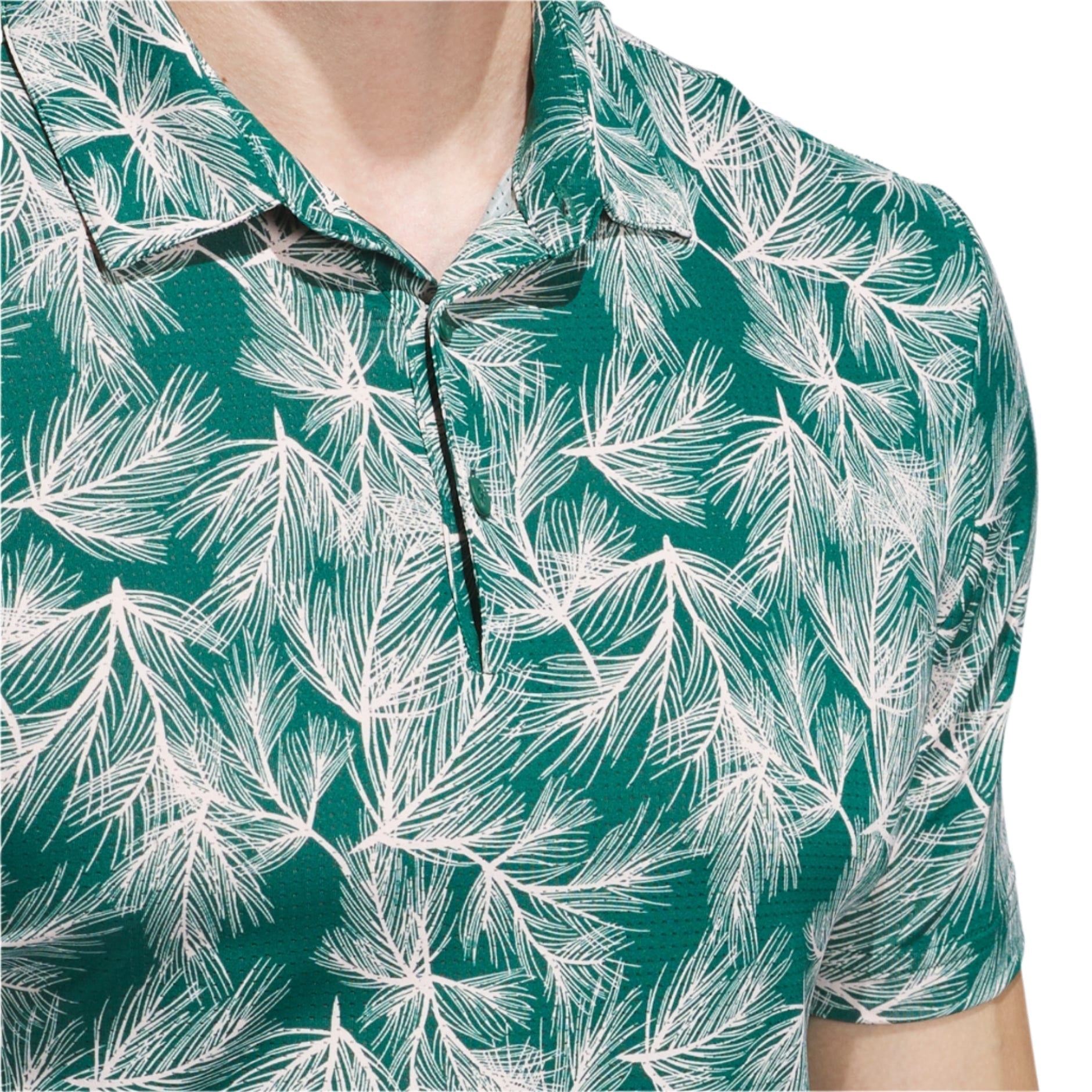 Green tropical leaf print polo shirt with zipper detail.