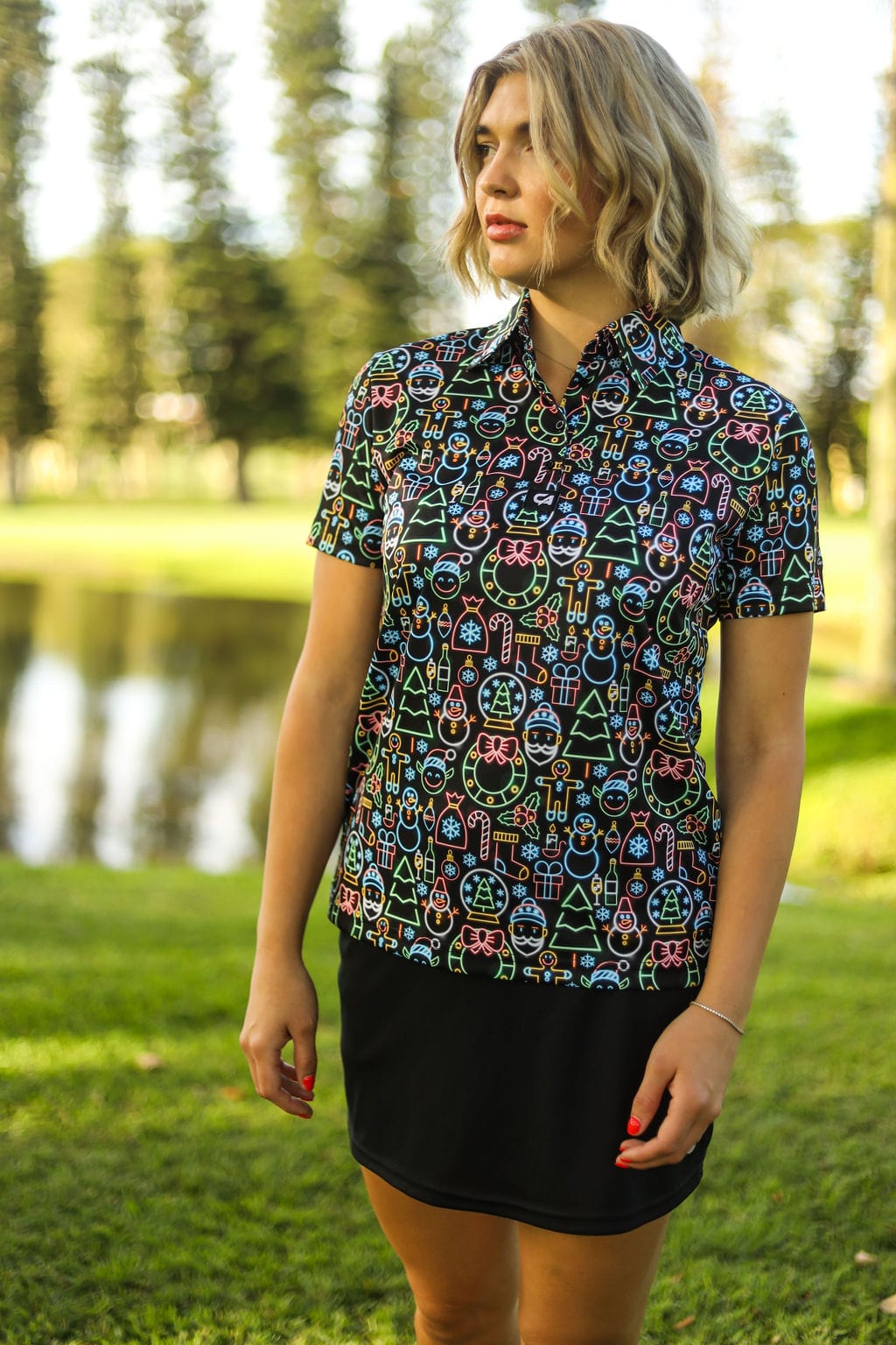 Custom Apparel Womens Funky Golf Shirt | Neon Light Christmas
