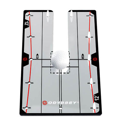 Odyssey golf practice mat with white ball and black frame.