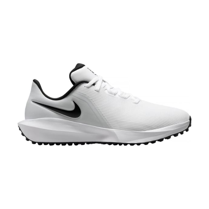 White and black nike golf shoe with textured sole design.