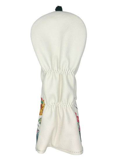 White floral golf club head cover with elastic drawstring closure.