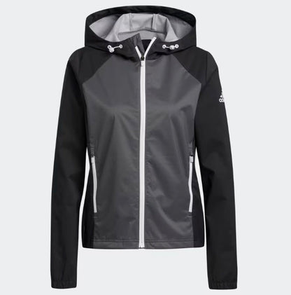 Adidas women’s black and gray windbreaker jacket with white zipper.