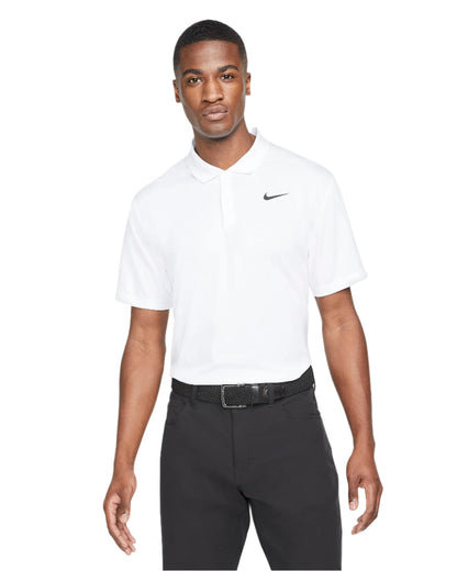 White nike polo shirt with black swoosh logo and collar details.
