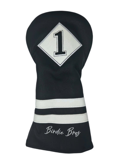 Black and white golf club head cover with ’birdie bros’ branding.